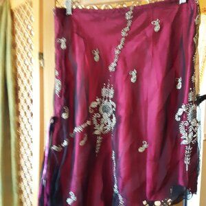 Red Asymmetrical skirt made from antique Indian Sari fabric.